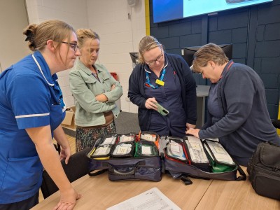 Community nurses examining their new bag
