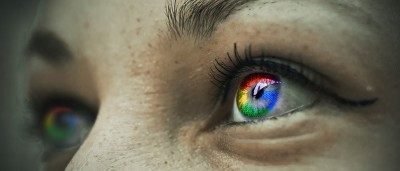 Girls's face with multo-coloured eyes