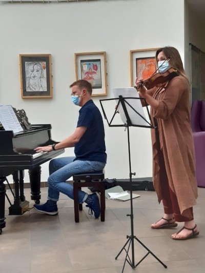 Two musicians performing