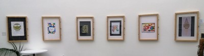 Image shows lino cut work on display.