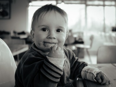 Baby using fingers to eat